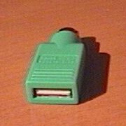 Foto del adaptador de USB a PS/2 del Logitech Pilot Wheel Mouse Optical